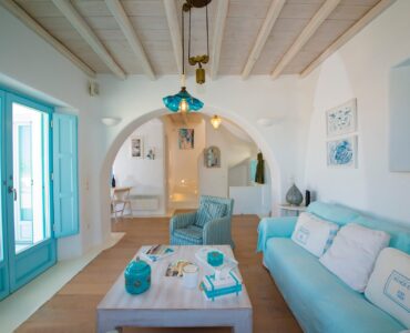 Living room with arched opening at Villa Danelina in Agios Lazaros, Mykonos