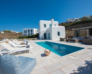 Pool terrace with sun loungers at Villa Danelina in Agios Lazaros, Mykonos