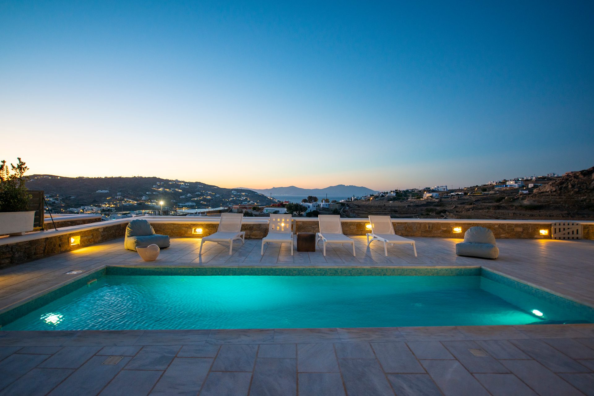 Pool under the sunset sky at Villa Danelina in Agios Lazaros, Mykonos