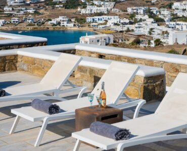 Sun loungers with view over the bay at Villa Danelina in Agios Lazaros, Mykonos