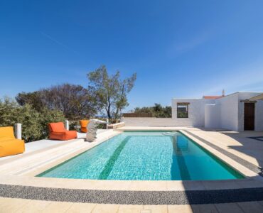 Pool and garden at Villa Gaia in Psarou, Mykonos