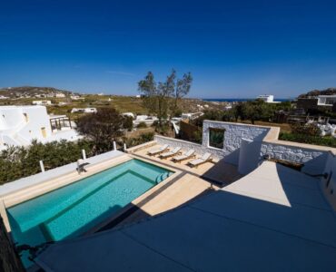 Pool and countryside views from above at Villa Gaia in Psarou, Mykonos