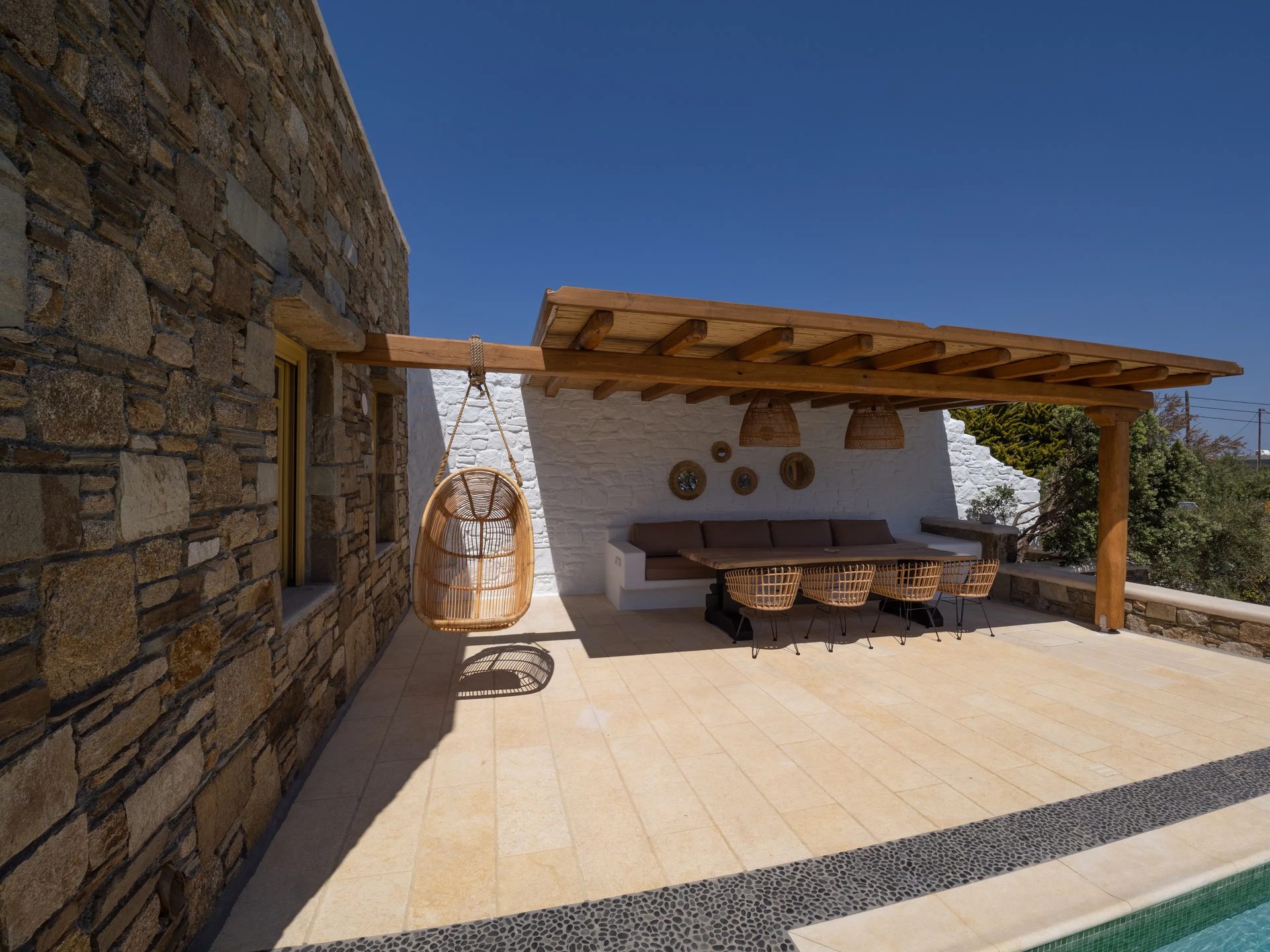 Pergola dining area at Villa Gaia in Psarou, Mykonos