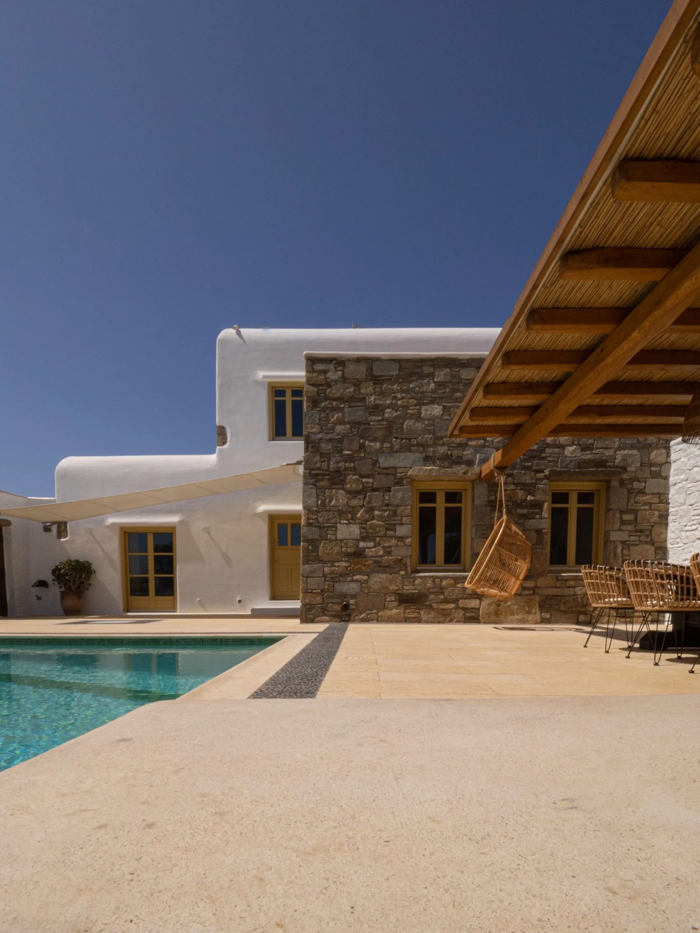 Courtyard and pergola at Villa Gaia in Psarou, Mykonos