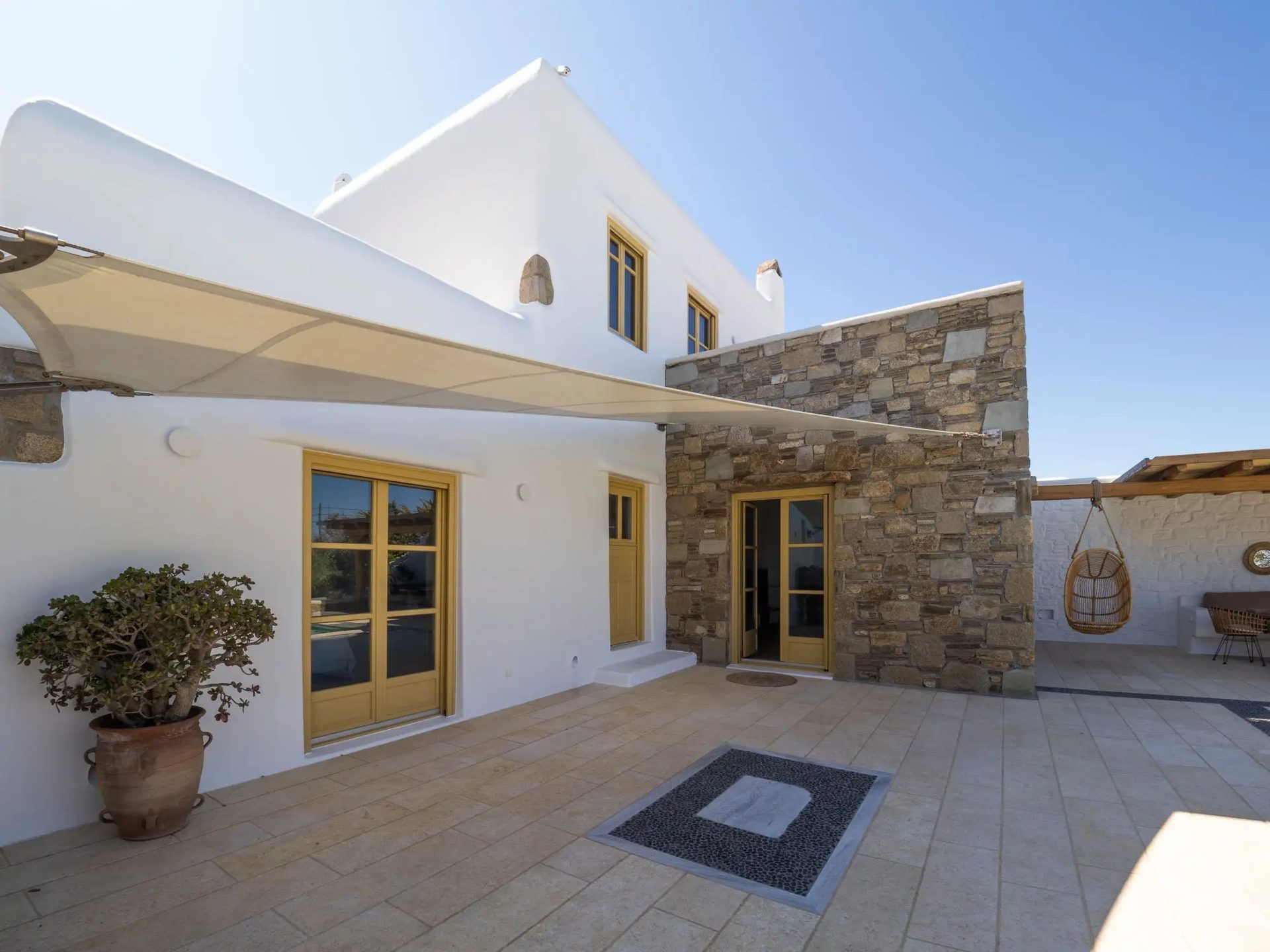 Courtyard entrance at Villa Gaia in Psarou, Mykonos