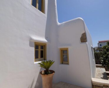 Whitewashed exterior detail at Villa Gaia in Psarou, Mykonos