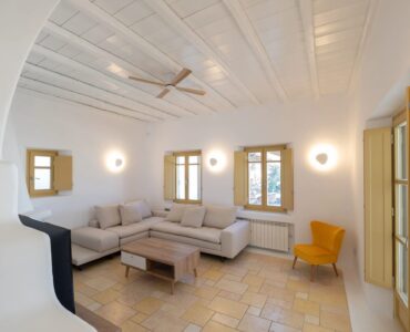 Living room with sofas at Villa Gaia in Psarou, Mykonos