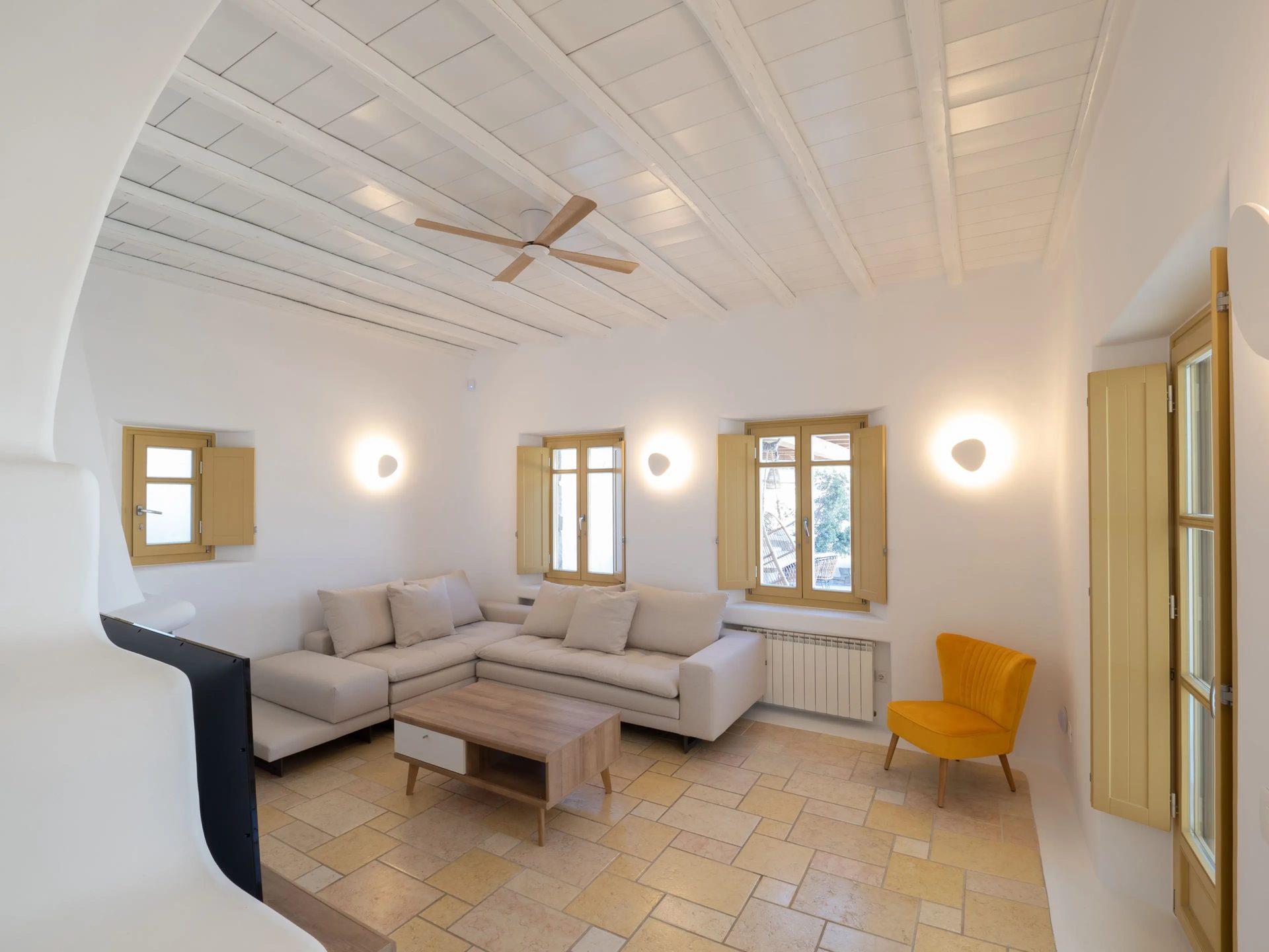 Living room with sofas at Villa Gaia in Psarou, Mykonos
