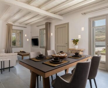 Living and dining area at Villa Kele in Ftelia, Mykonos