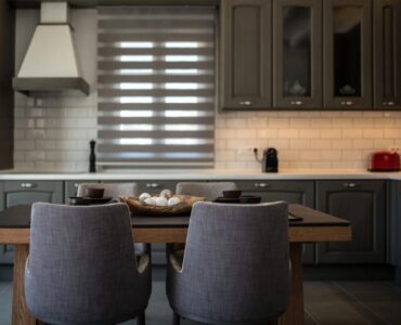 Kitchen and dining table at Villa Kele in Ftelia, Mykonos