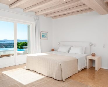 Bedroom with sea view at Villa Kymothea in Agios Lazaros, Mykonos