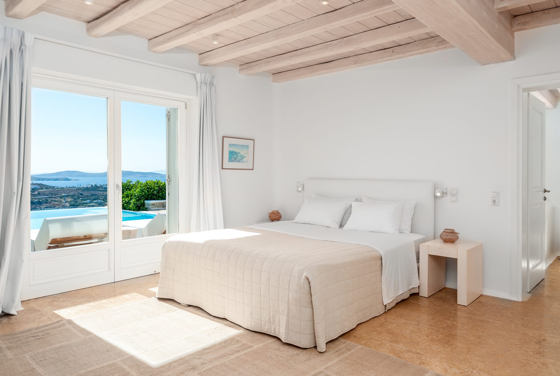 Bedroom with sea view at Villa Kymothea in Agios Lazaros, Mykonos