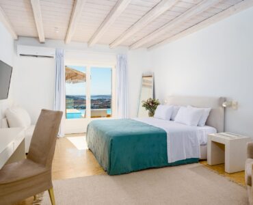 Bedroom with sea view at Villa Kymothea in Agios Lazaros, Mykonos
