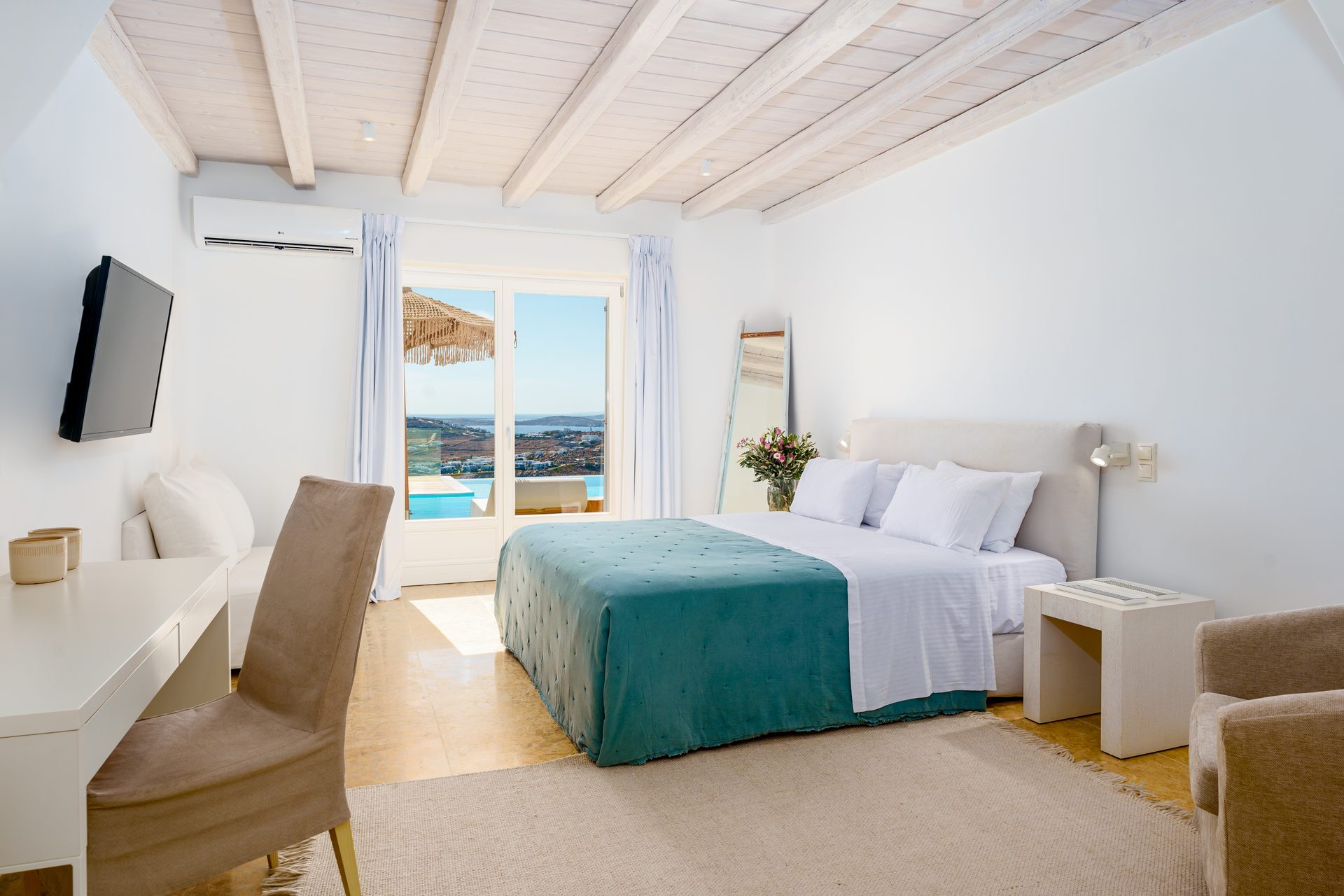 Bedroom with sea view at Villa Kymothea in Agios Lazaros, Mykonos