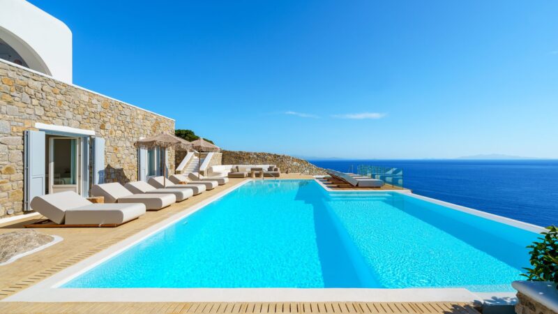 Infinity pool and the Aegean Sea at Villa Kymothea in Agios Lazaros, Mykonos