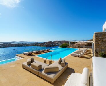 Lounge by the pool at Villa Kymothea in Agios Lazaros, Mykonos