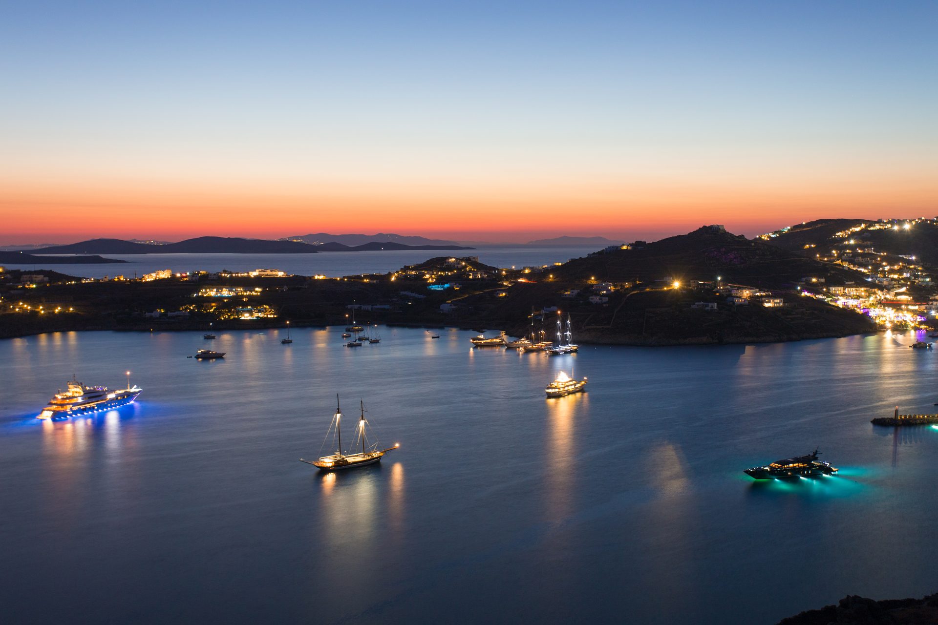 Ornos bay at night at Villa Kymothea in Agios Lazaros, Mykonos
