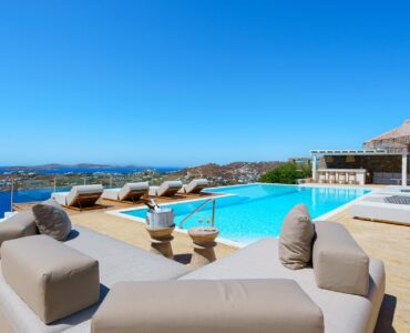 Outdoor lounge with sea view at Villa Kymothea in Agios Lazaros, Mykonos