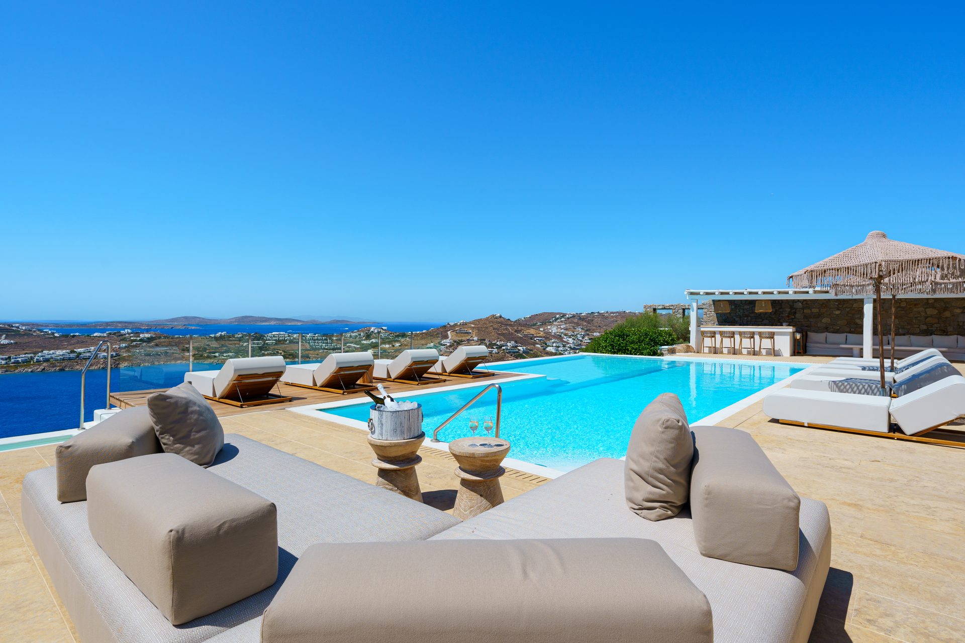 Outdoor lounge with sea view at Villa Kymothea in Agios Lazaros, Mykonos