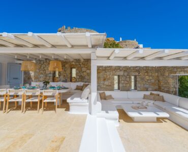Pergola-covered lounge at Villa Kymothea in Agios Lazaros, Mykonos