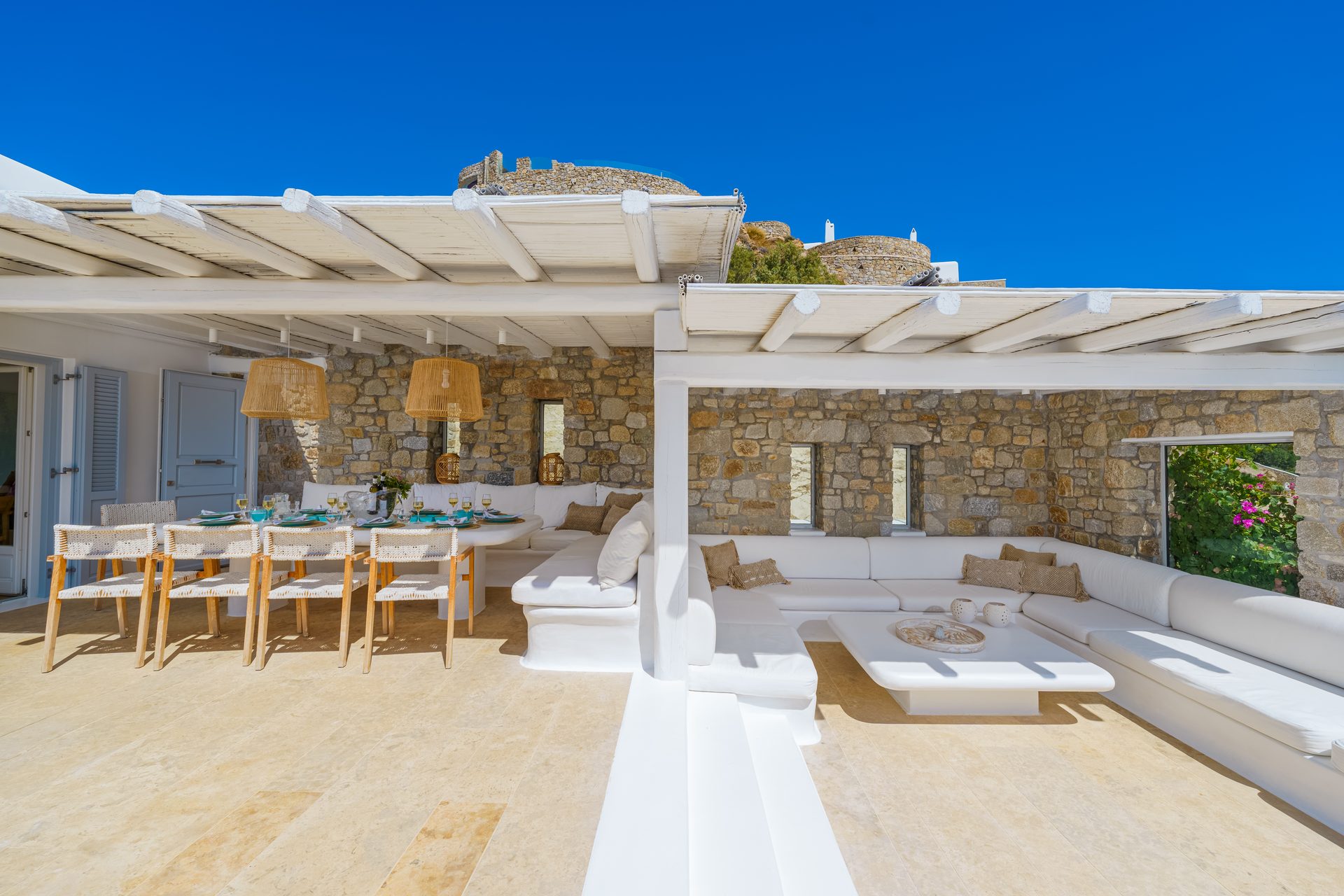 Pergola-covered lounge at Villa Kymothea in Agios Lazaros, Mykonos