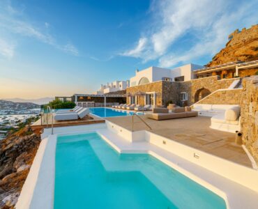 Pool looking back towards the villa at Villa Kymothea in Agios Lazaros, Mykonos