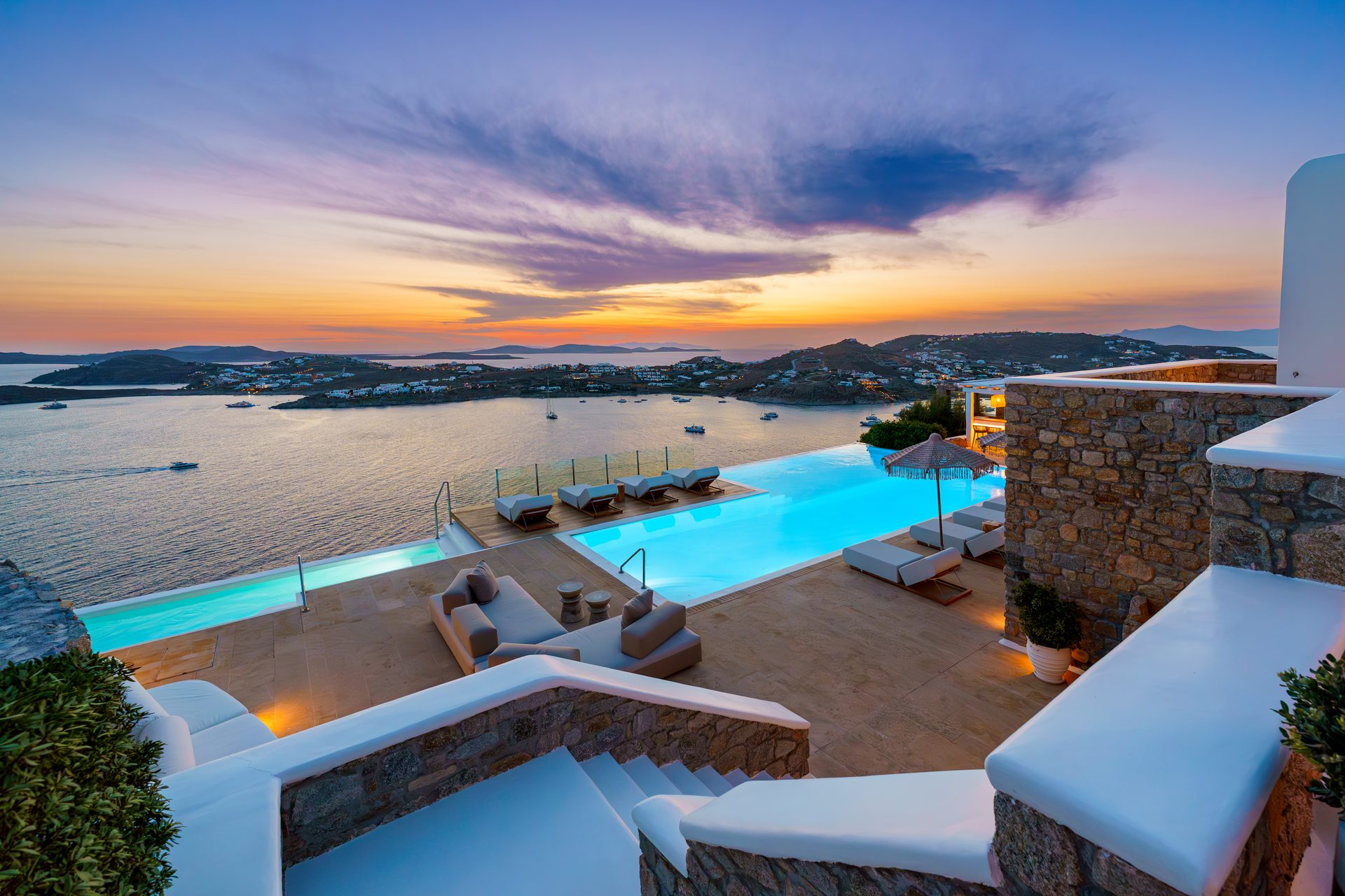 Terrace at sunset at Villa Kymothea in Agios Lazaros, Mykonos