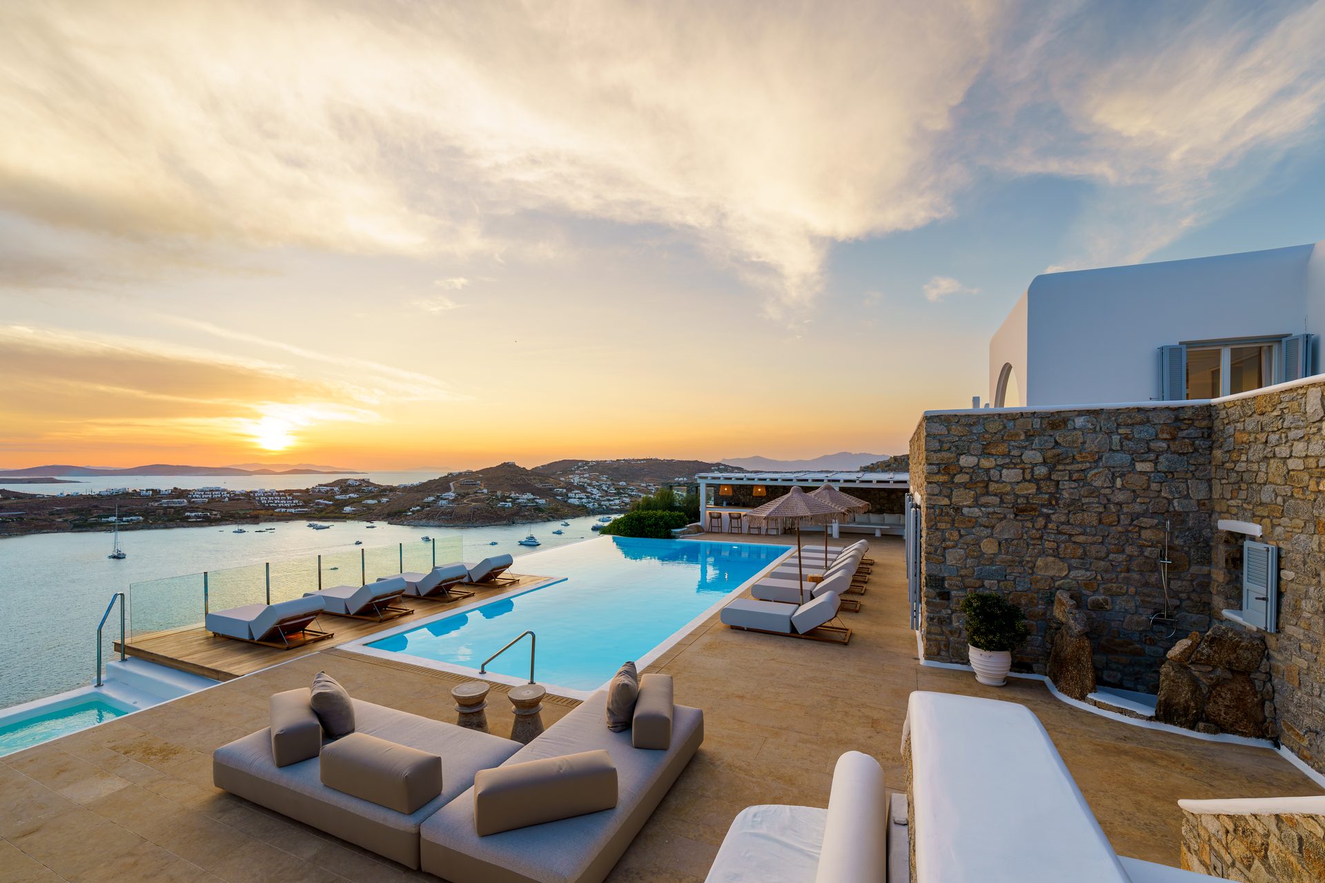 Terrace at sunset at Villa Kymothea in Agios Lazaros, Mykonos