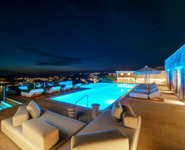 Terrace lounge at night at Villa Kymothea in Agios Lazaros, Mykonos