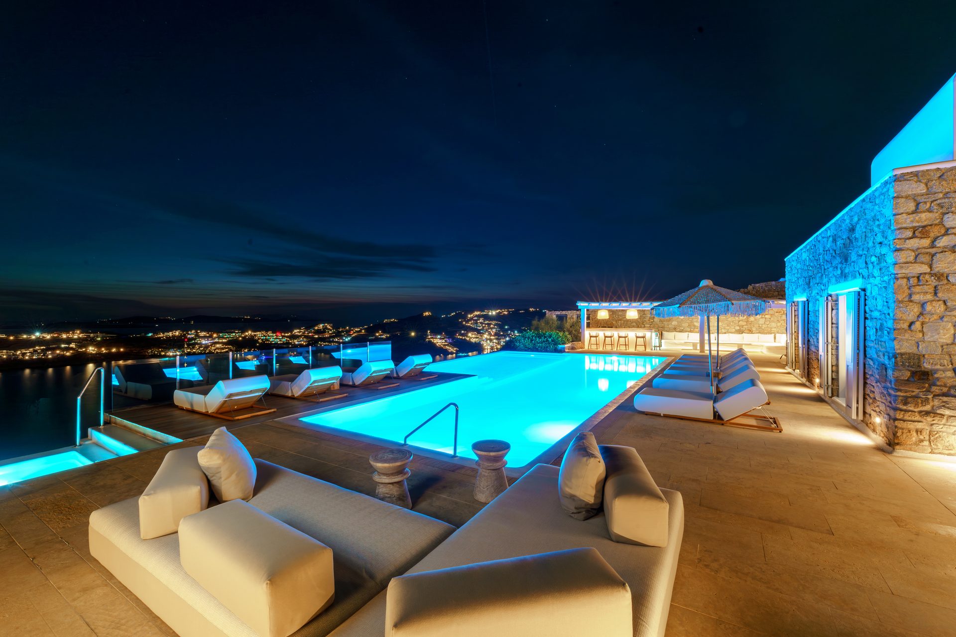Terrace lounge at night at Villa Kymothea in Agios Lazaros, Mykonos