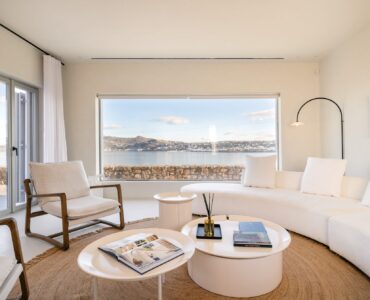 Lounge with panoramic window at Villa Mare Blu in Kanalia, Mykonos