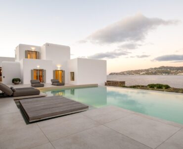 Pool and villa at sunset at Villa Mare Blu in Kanalia, Mykonos