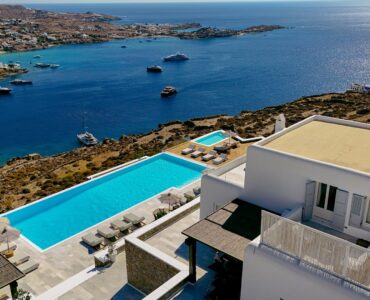 Aerial view of the pool and bay at Villa Nafsithoi in Agios Lazaros, Mykonos