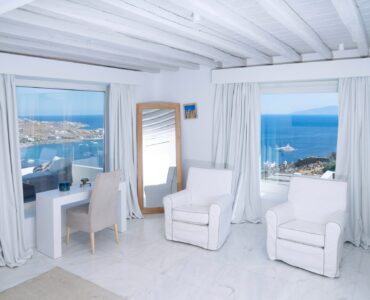 Bedroom sitting area at Villa Nafsithoi in Agios Lazaros, Mykonos