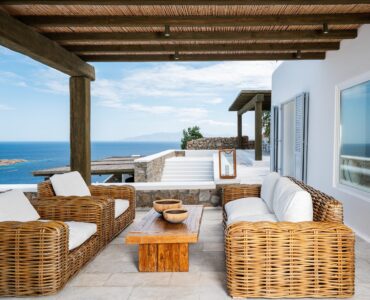 Covered lounge with sea view at Villa Nafsithoi in Agios Lazaros, Mykonos