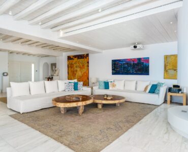 Living room with sofas at Villa Nafsithoi in Agios Lazaros, Mykonos
