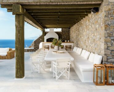 Pergola-covered outdoor lounge at Villa Nafsithoi in Agios Lazaros, Mykonos