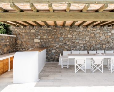 Summer kitchen and outdoor dining at Villa Nafsithoi in Agios Lazaros, Mykonos