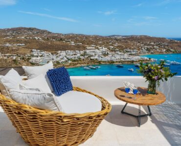 Terrace armchair with sea view at Villa Nafsithoi in Agios Lazaros, Mykonos