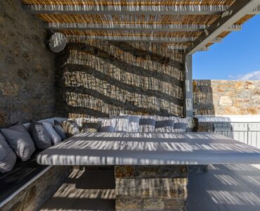 Covered outdoor lounge at Villa Nerovino in Kanalia, Mykonos