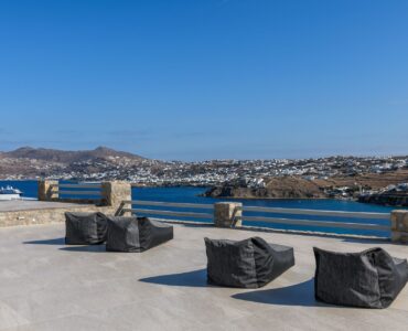 Outdoor seating with sea view at Villa Nerovino in Kanalia, Mykonos