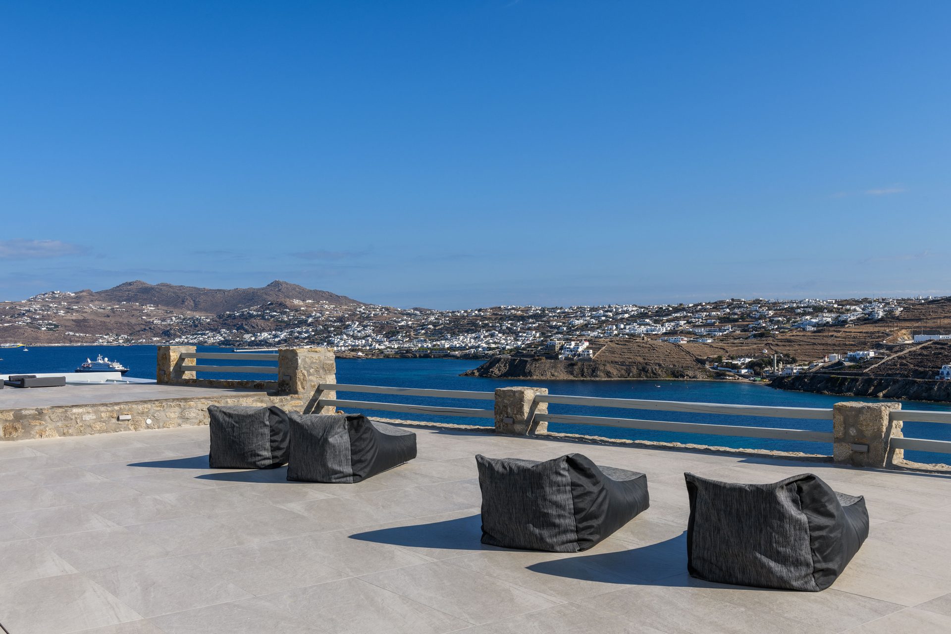 Outdoor seating with sea view at Villa Nerovino in Kanalia, Mykonos