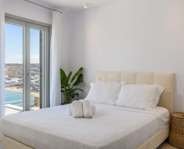 Bedroom with sea view at Villa Nerovino in Kanalia, Mykonos
