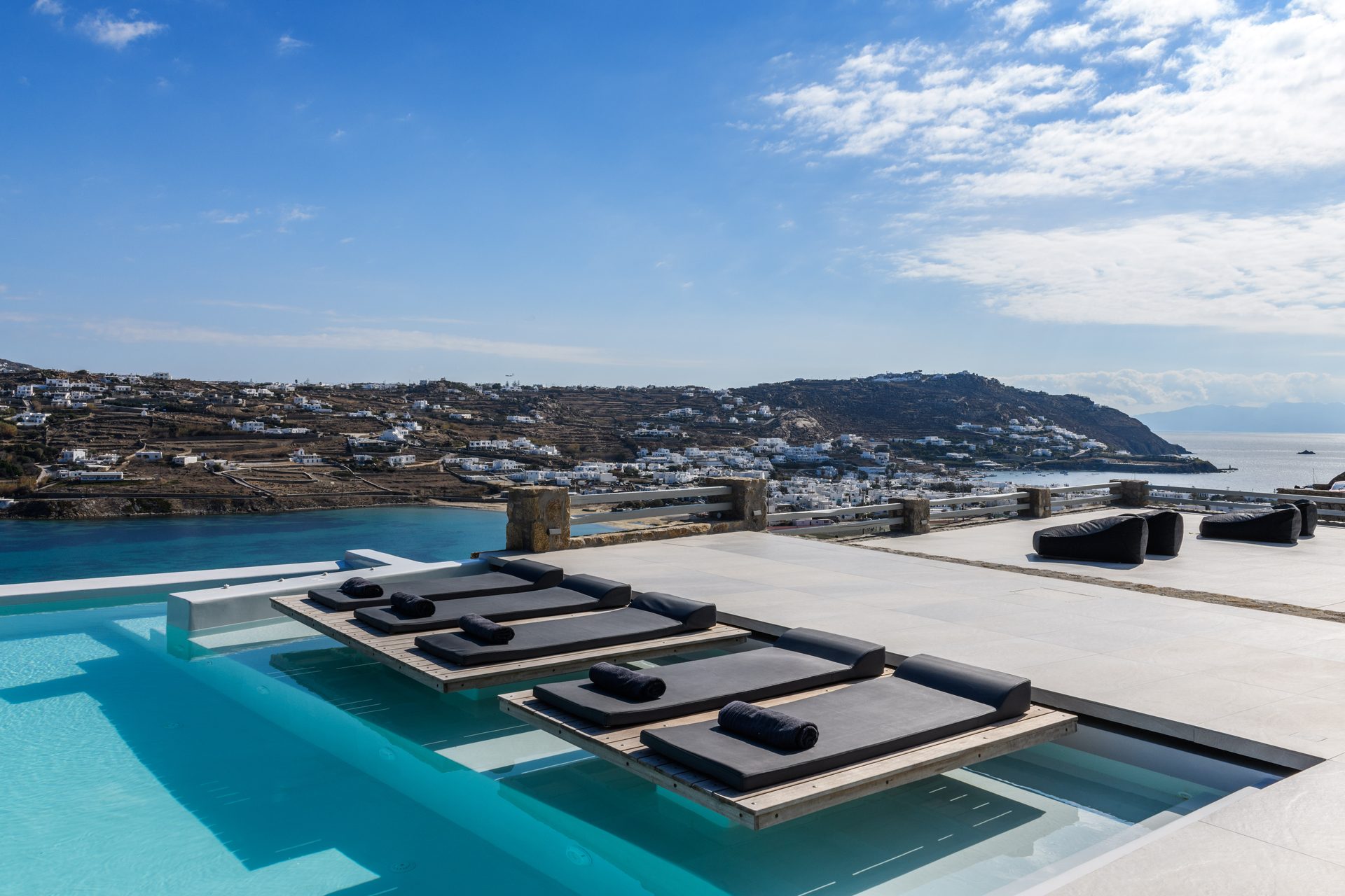 In-pool sun loungers with sea view at Villa Nerovino in Kanalia, Mykonos