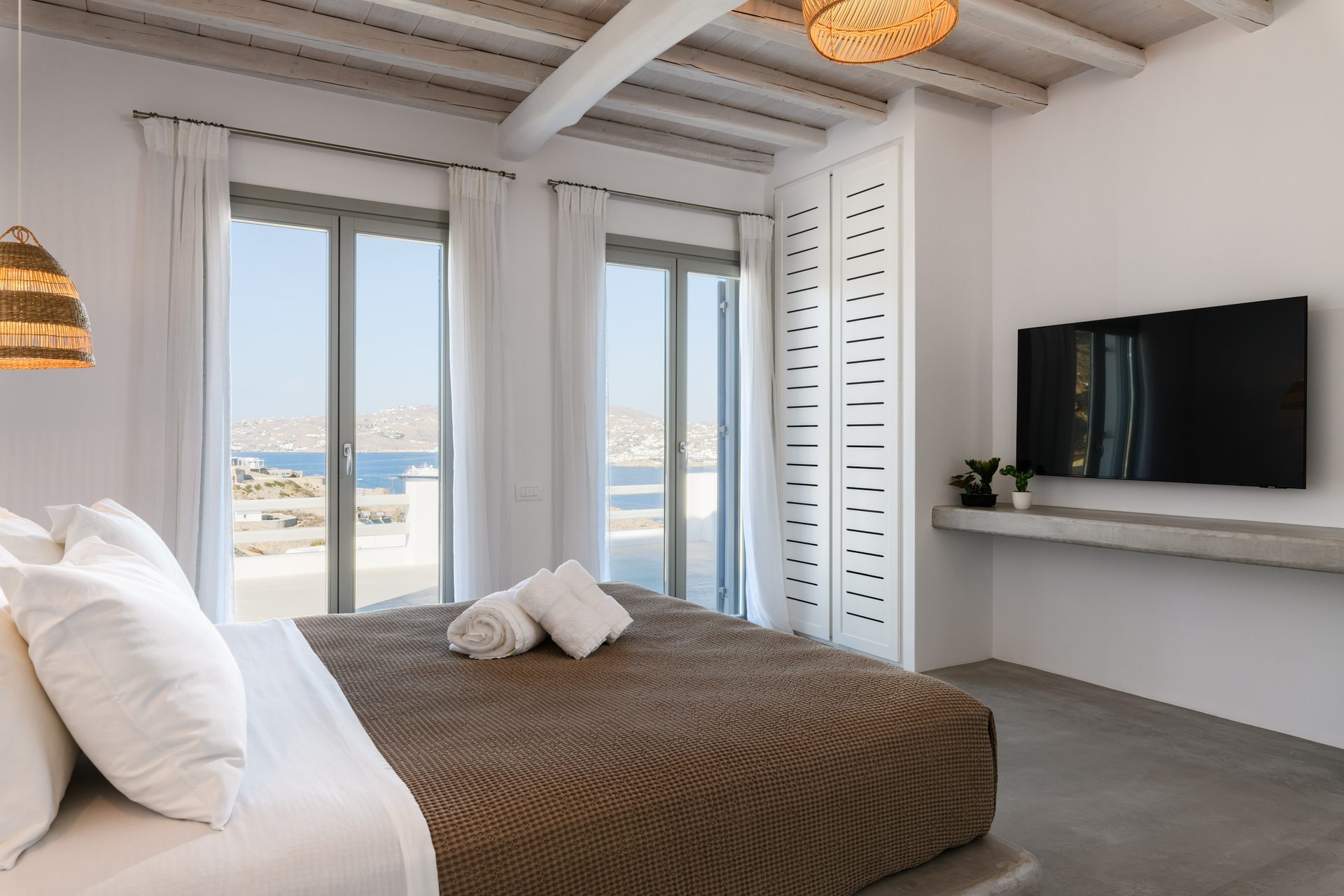 Bedroom with sea view at Villa Nerovino in Kanalia, Mykonos