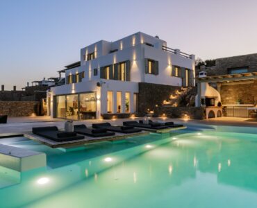 Villa and pool at dusk at Villa Nerovino in Kanalia, Mykonos