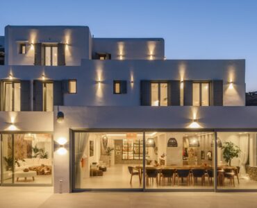 Villa lit at dusk at Villa Nerovino in Kanalia, Mykonos