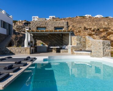 Pool and stone terraces at Villa Nerovino in Kanalia, Mykonos
