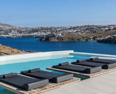 Pool terrace with sea view at Villa Nerovino in Kanalia, Mykonos