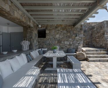 Covered outdoor lounge at Villa Pergisos in Kanalia, Mykonos
